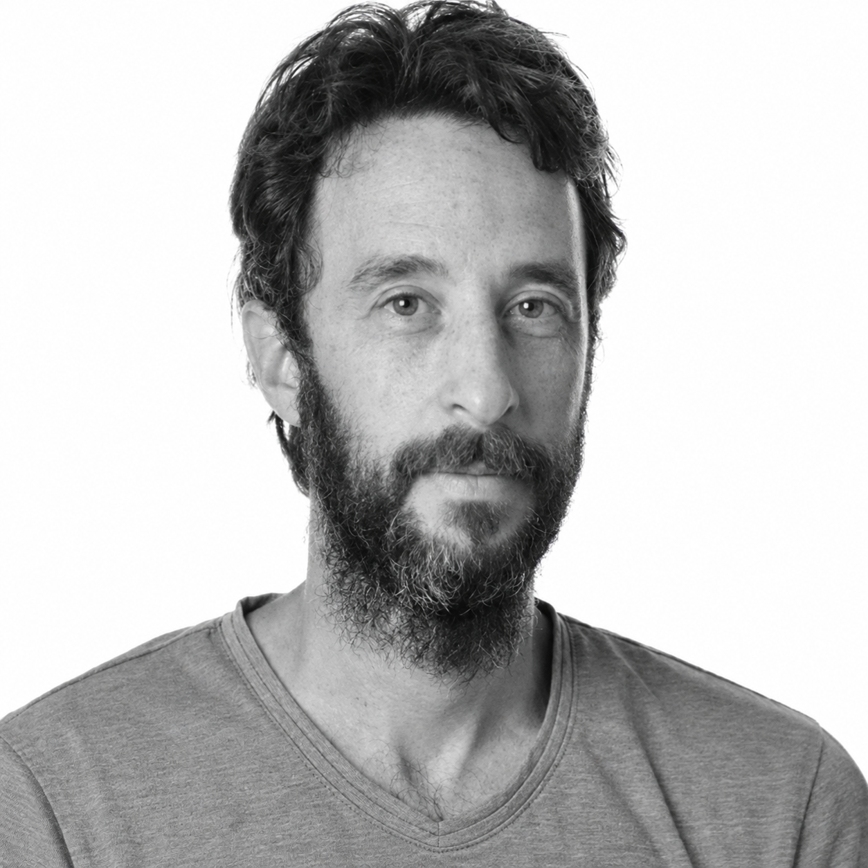 Grayscale Portrait of a Bearded Man